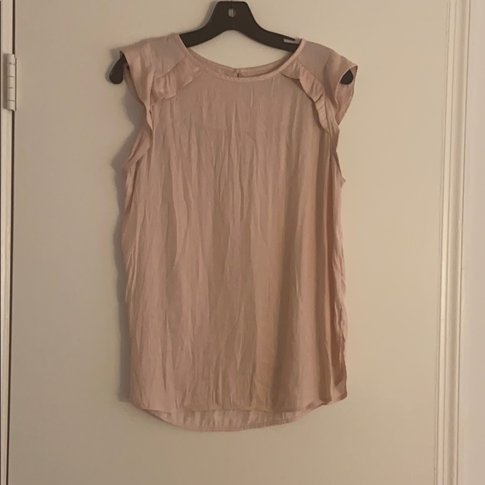Light pink sleeveless blouse